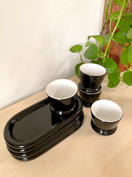 Set of Four - Black and white Handleless Teacup and Oblong Saucer Set